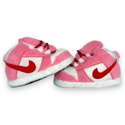 OG Pink Sneaker Slippers – angled pair display showing red swoosh-style detailing and white lining for a sneaker-style look.