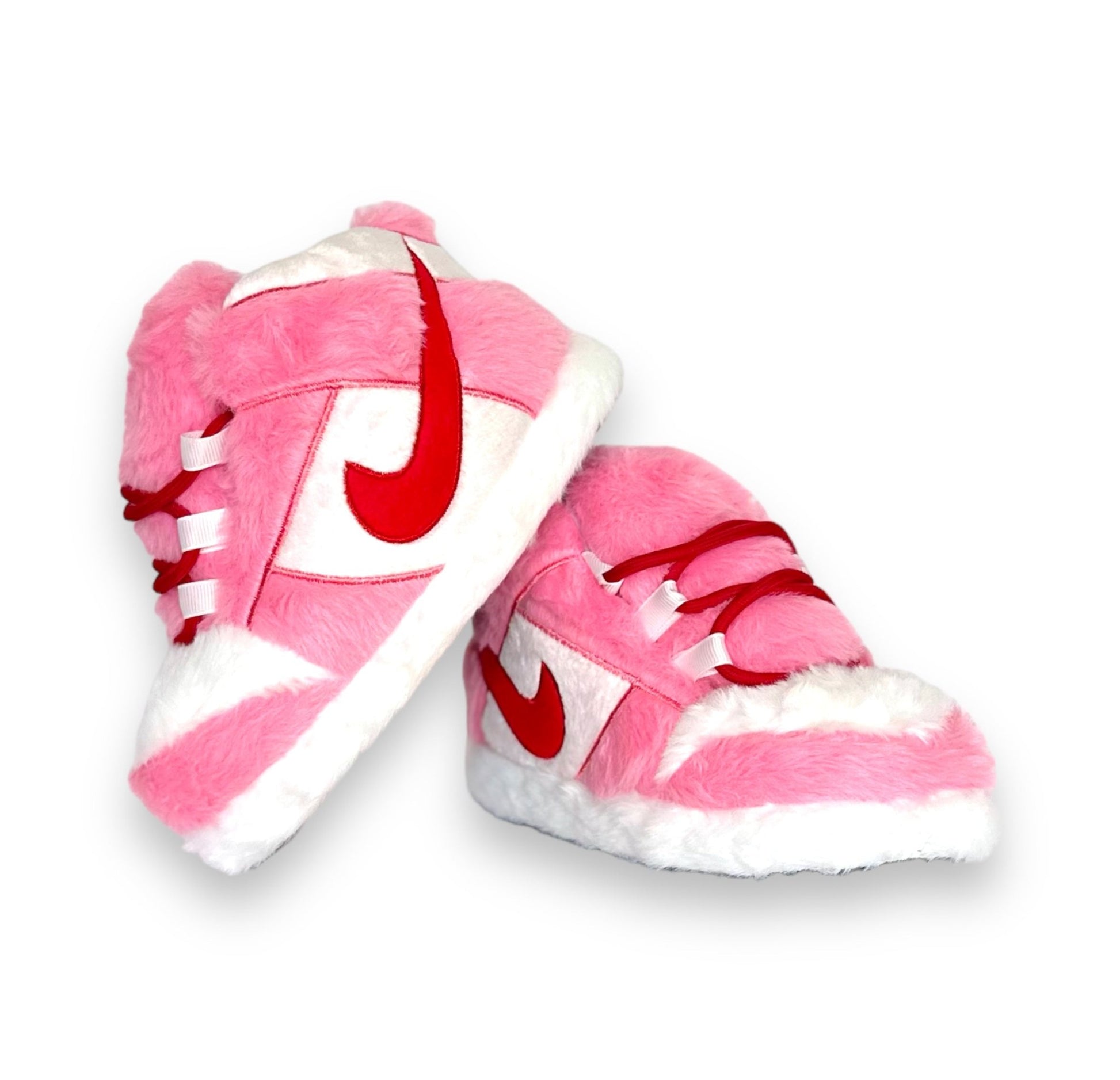 OG Pink Sneaker Slippers for kids – plush pink and white sneaker-inspired slippers with red accents, shown on white background.