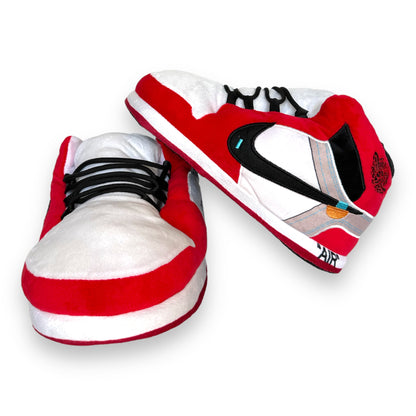 OG AIR Sneaker Slippers – plush red, black, and white sneaker-inspired slippers with lace details and soft foam base on white background.
