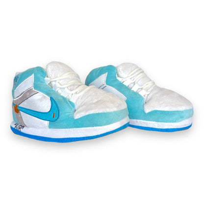 OG AIR Sneaker Slippers for kids – baby-blue and white plush sneaker-inspired slippers with soft foam soles and lace details.